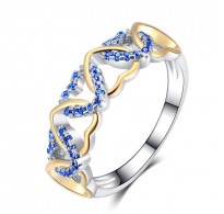 Srebrn prstan z modrimi in zlatimi srci 